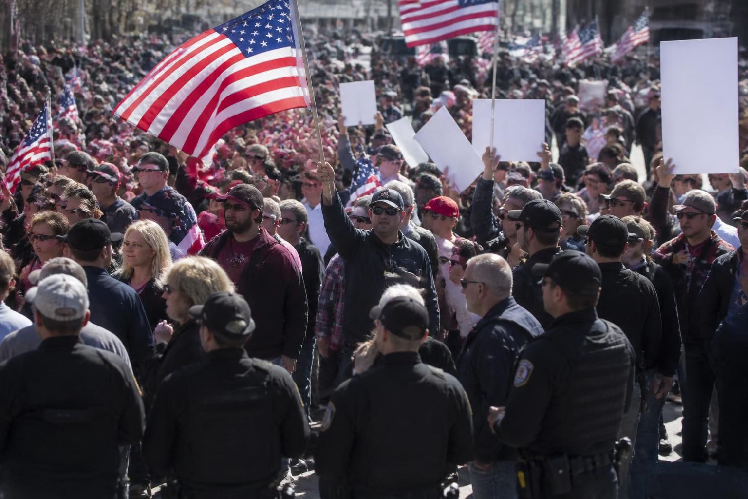us conservatives organize a nationwide day of protest to oppose unchecked policies, advocating for change and voicing their concerns across the country.