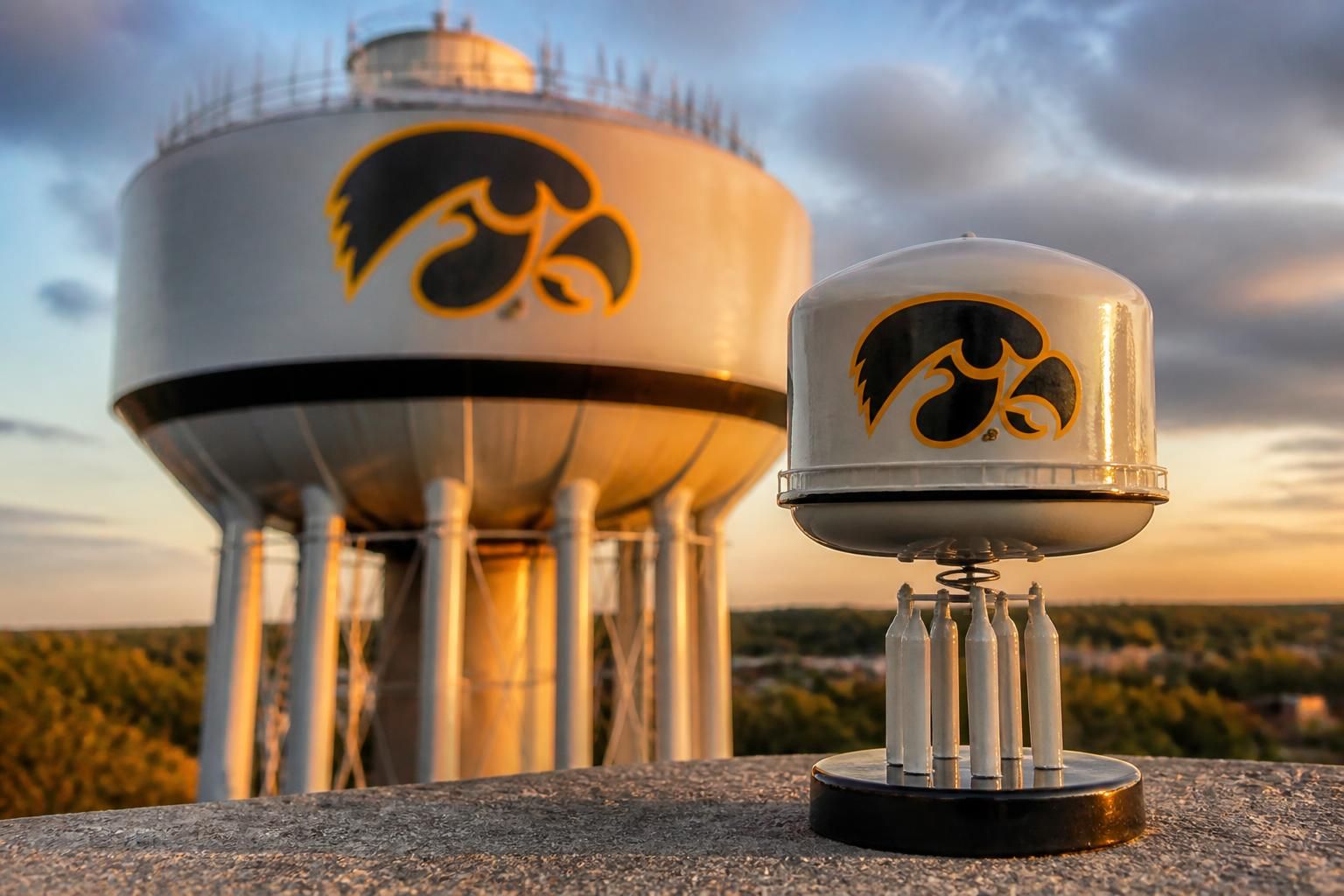 celebrate iowa city's iconic tigerhawk water tower with a unique bobblehead that captures its charm and significance in the community.